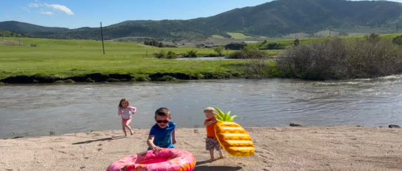 Kids playing on the Portneuf River at Lost Trail Resort